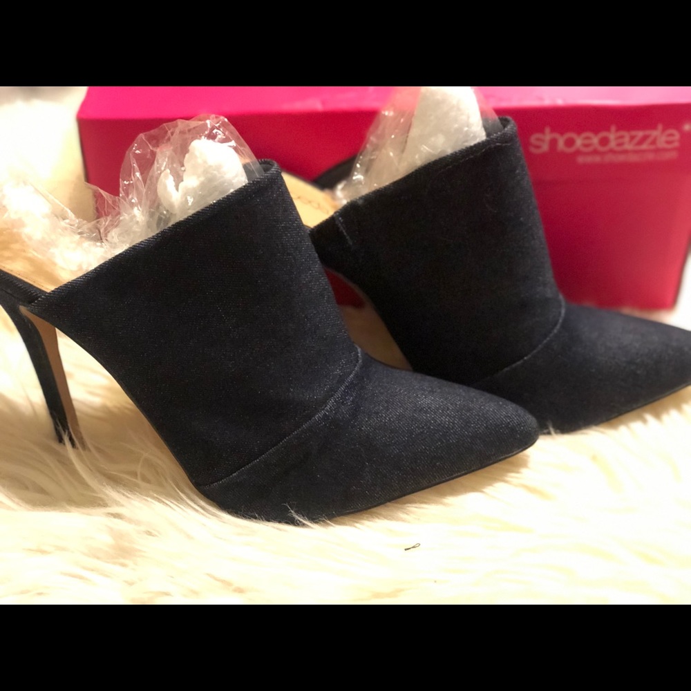 Cute slide on heeled denim shoes.